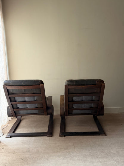 Danish beech bentwood and leather lounge chairs. Sold individually.