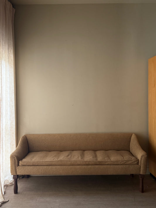 Damask upholstered settee with turned walnut legs