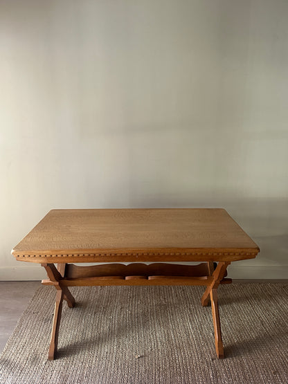 Danish oak dining table with removable leaves by Henning Kjaernulf