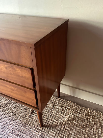 Walnut nine drawer, chrome knob dresser