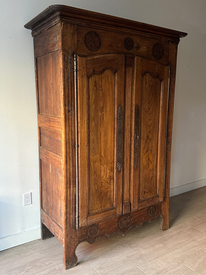 Carved armoire