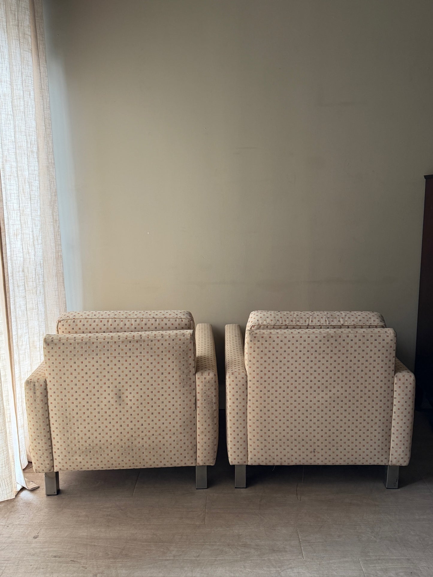 Upholstered chrome armchairs. Right.