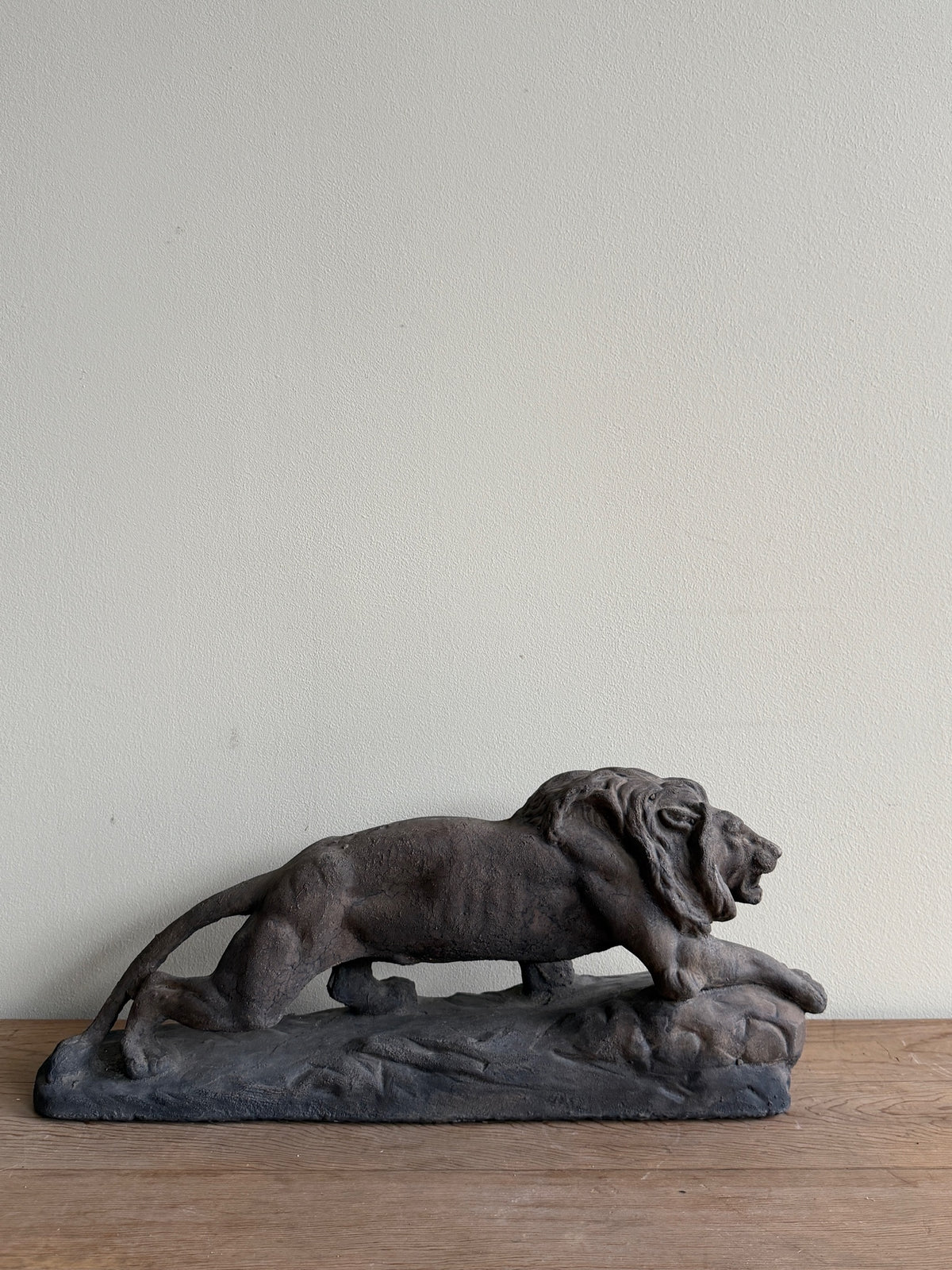 Cast-concrete lion sculpture