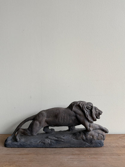 Cast-concrete lion sculpture