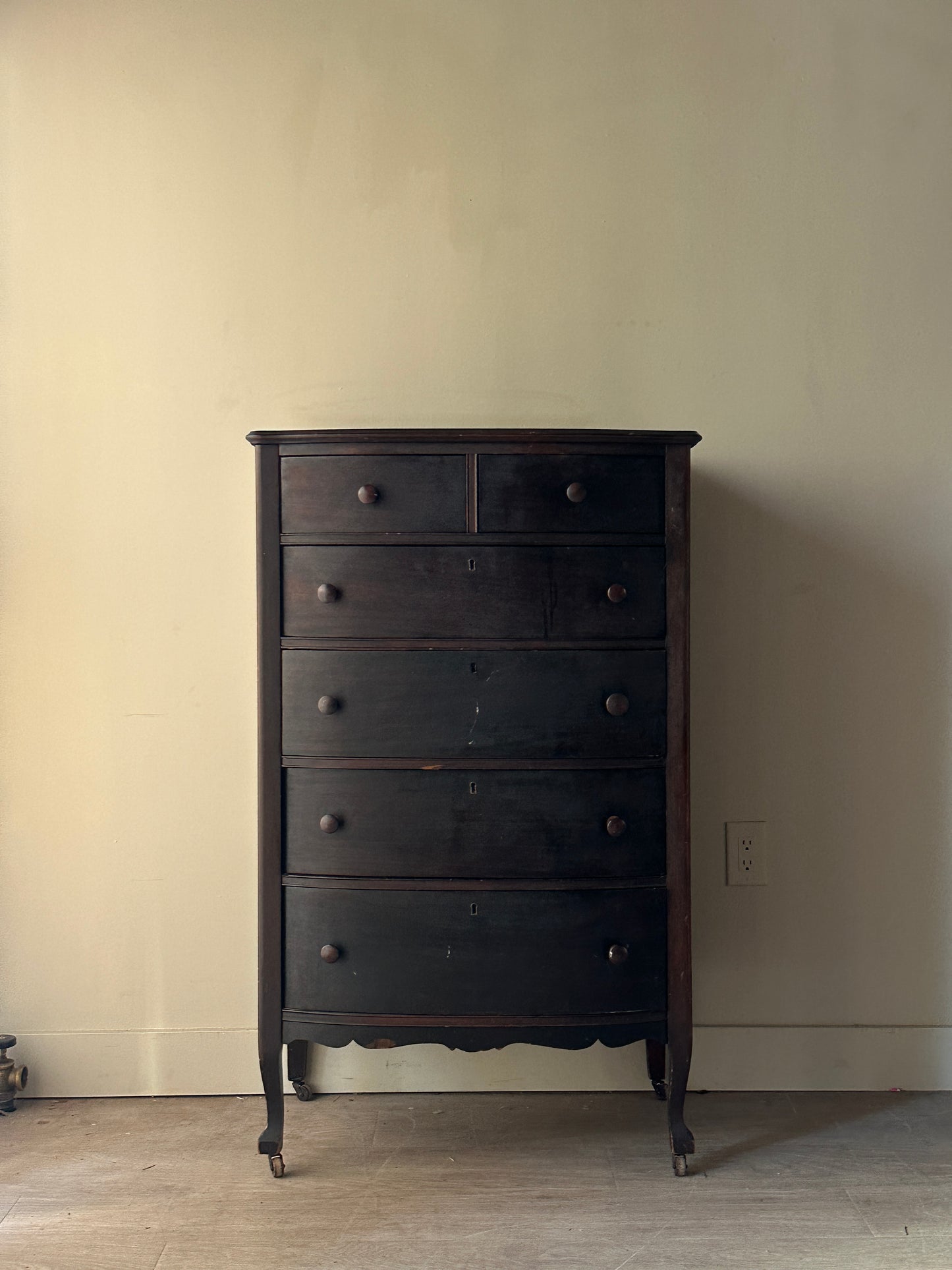 Dark walnut bow front dresser