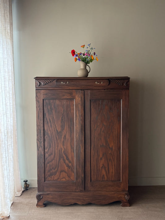 Golden oak cupboard with mirror
