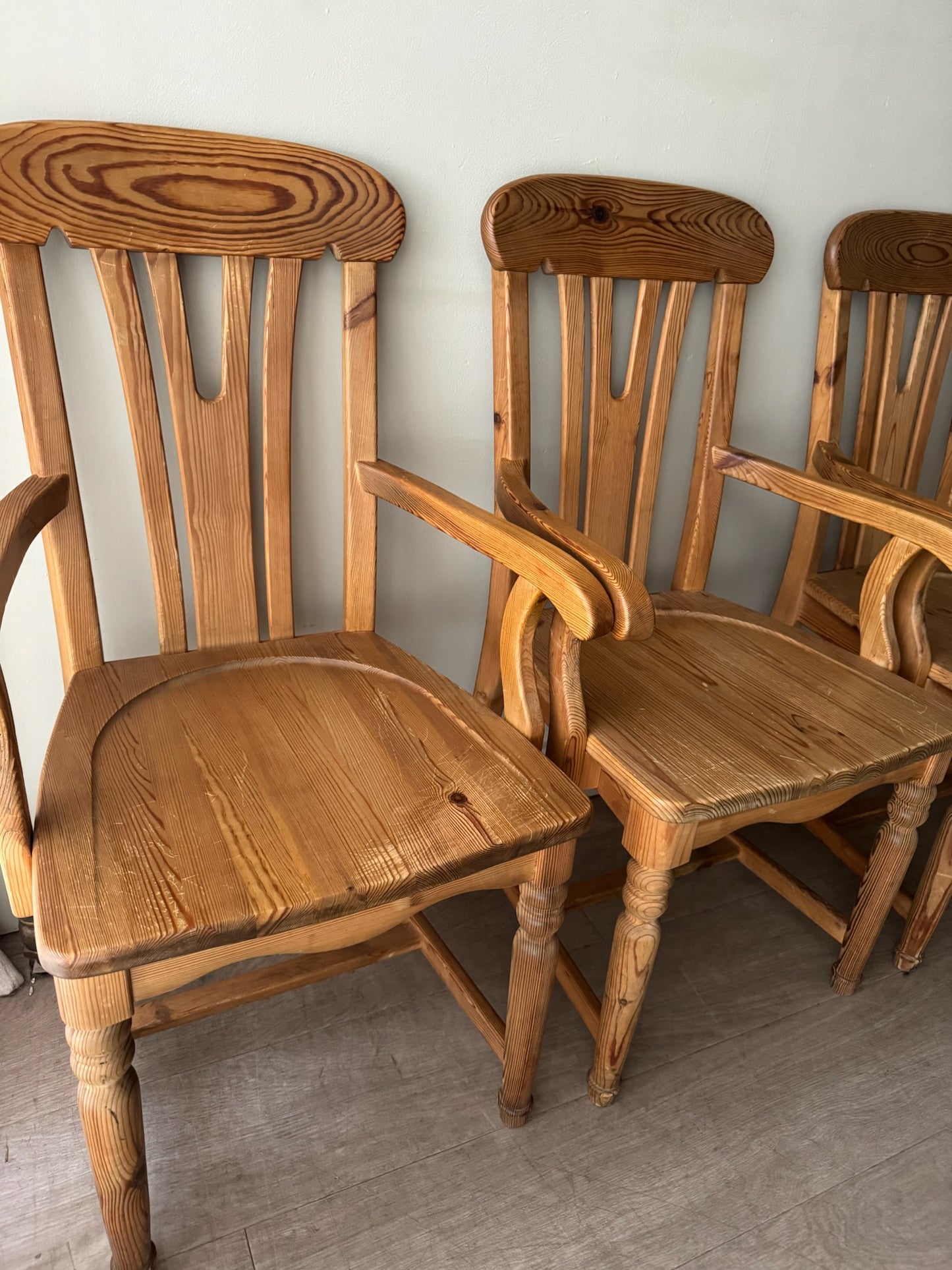 Scandinavian pine dining chairs. Sold in pairs.