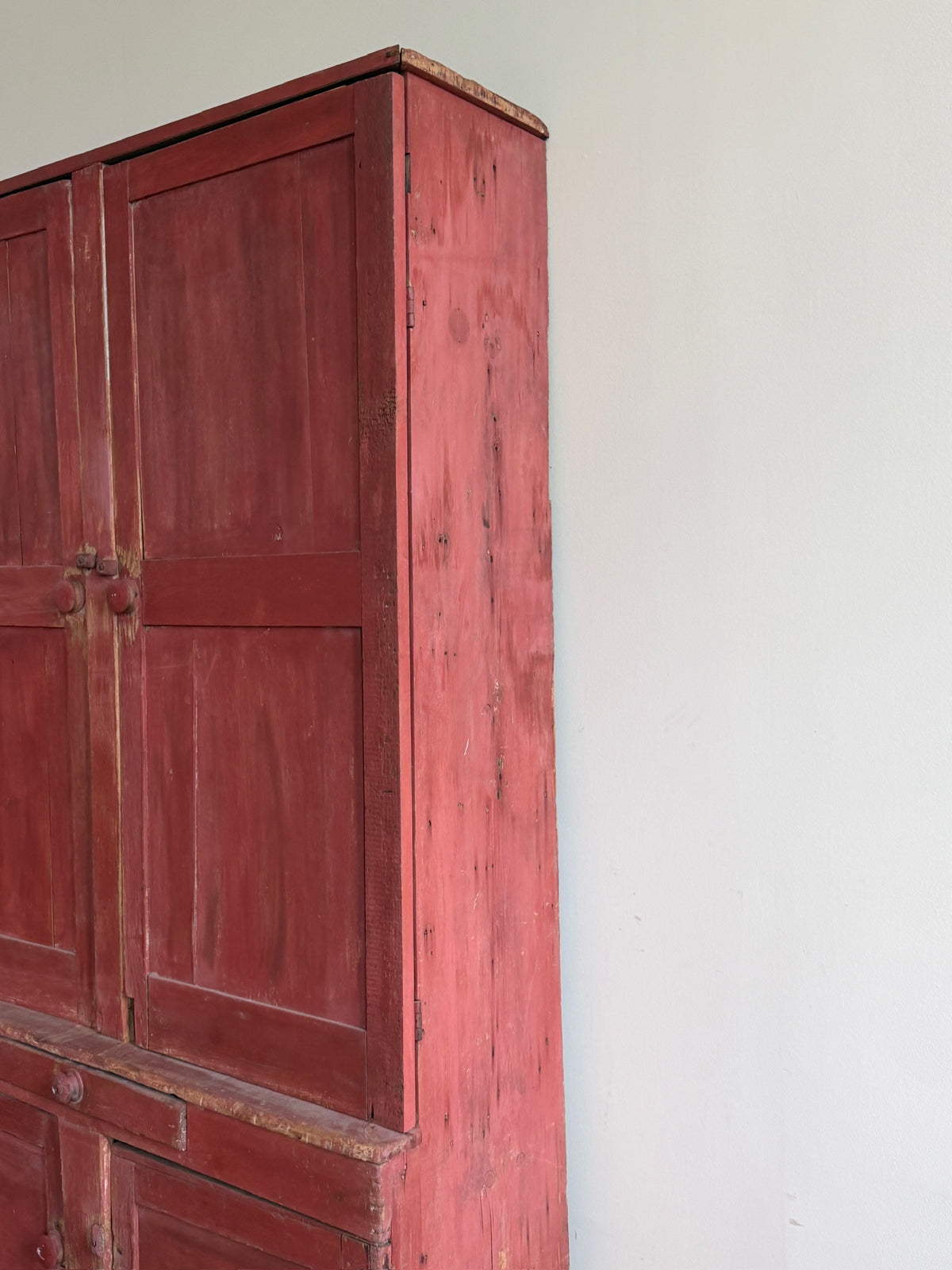 Pennsylvania red painted pine one piece stepback cupboard