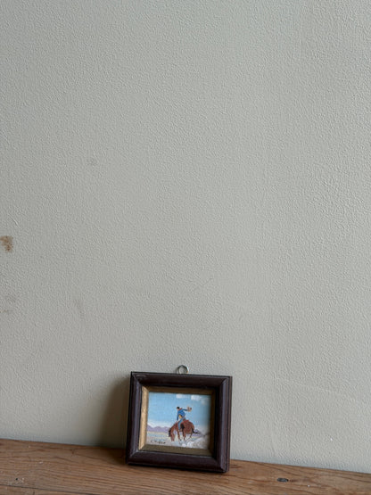 Small cowboy oil painting by E. Hofer