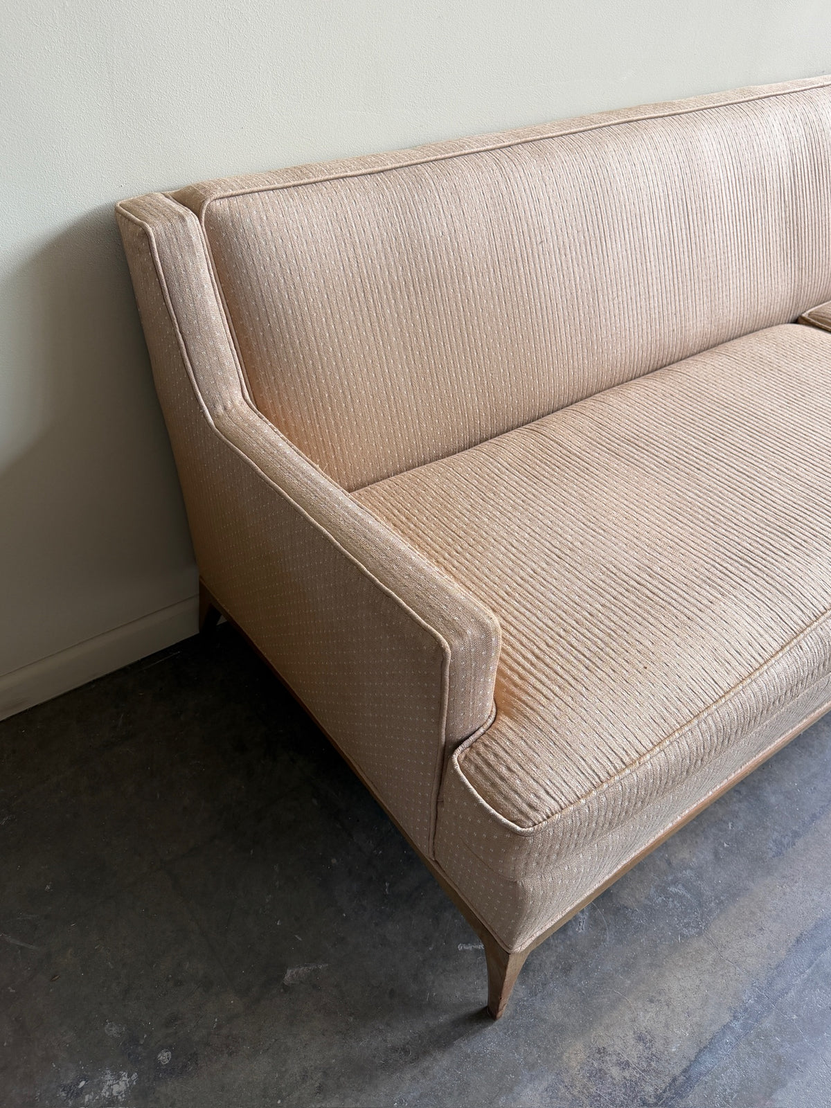 Tuxedo arm beige sofa