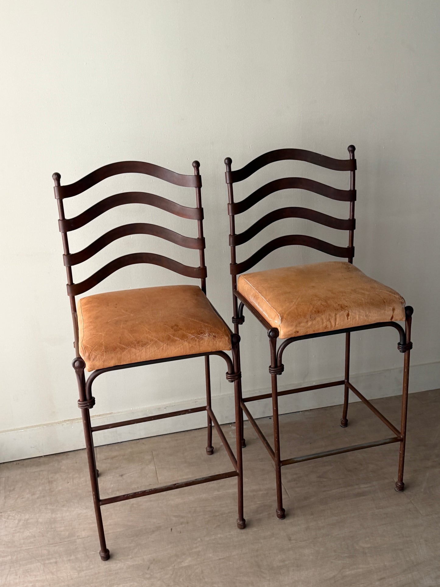 Wrought iron bar stools. Sold as pair.