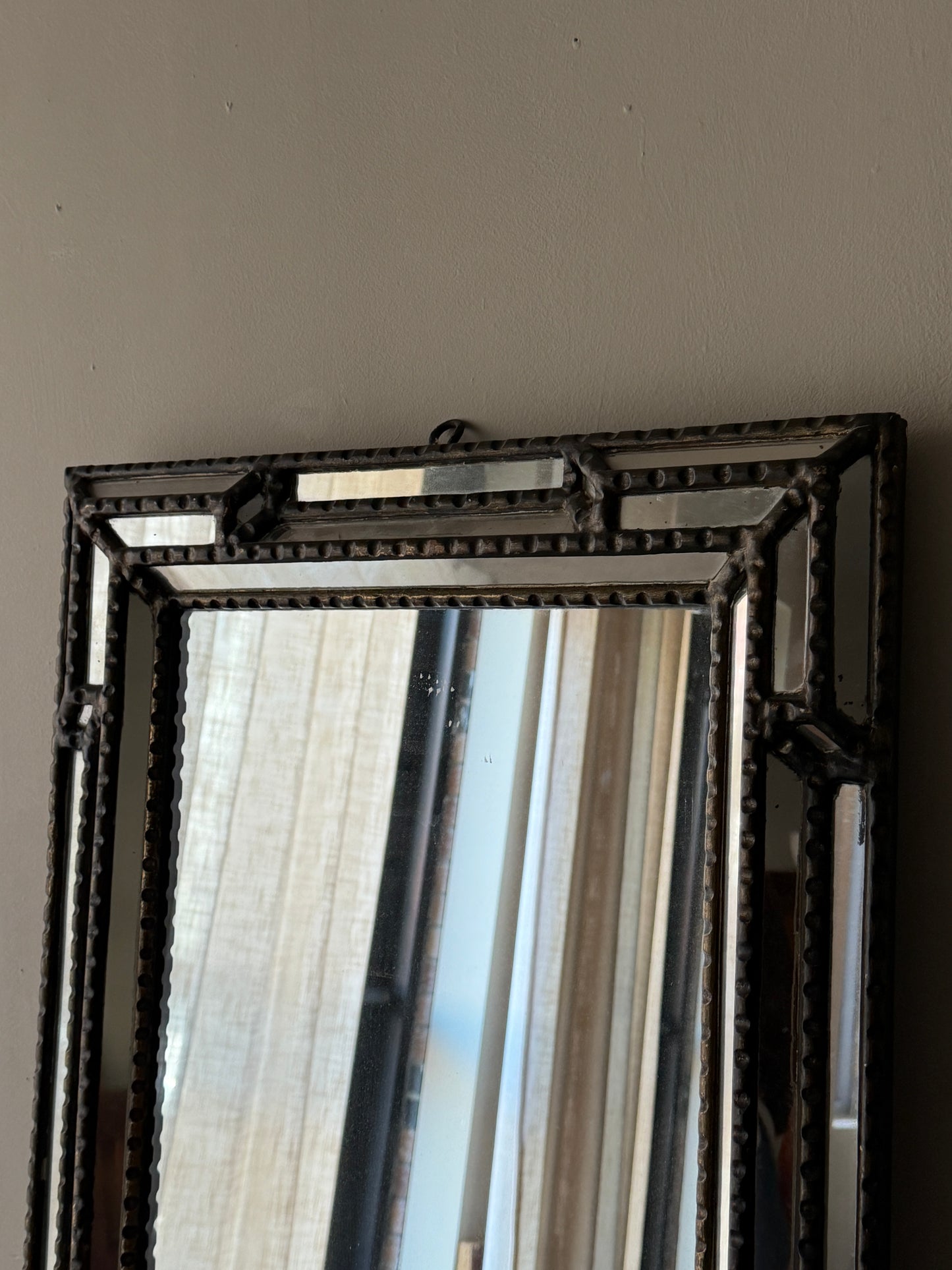 Beaded wall mirror