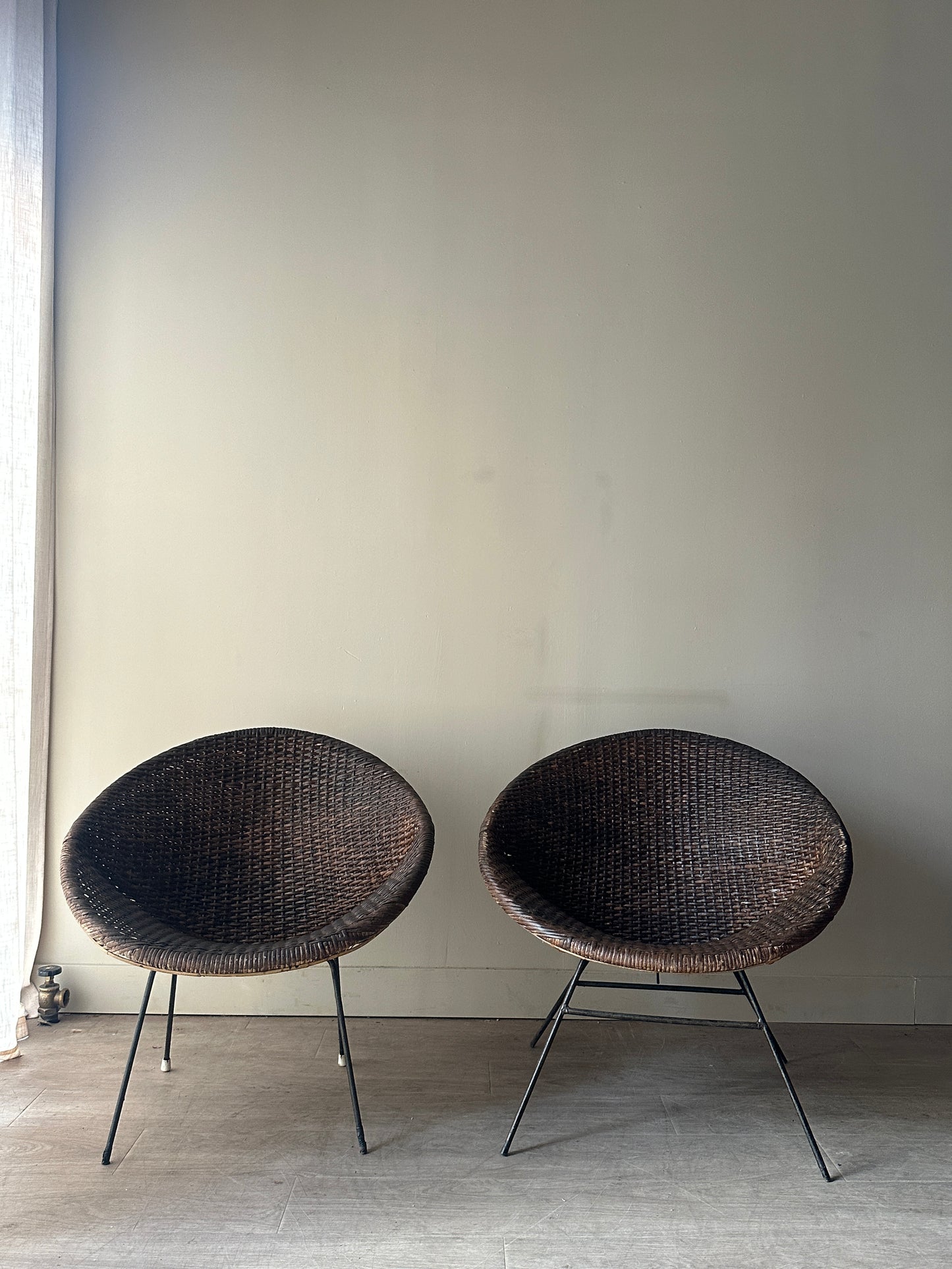 Woven rattan hoop chairs. Sold individually.