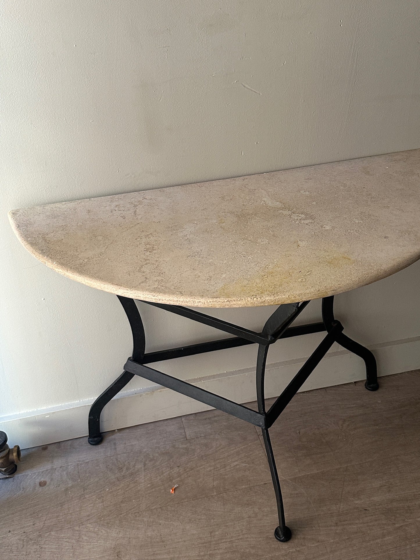 Travertine demilune table