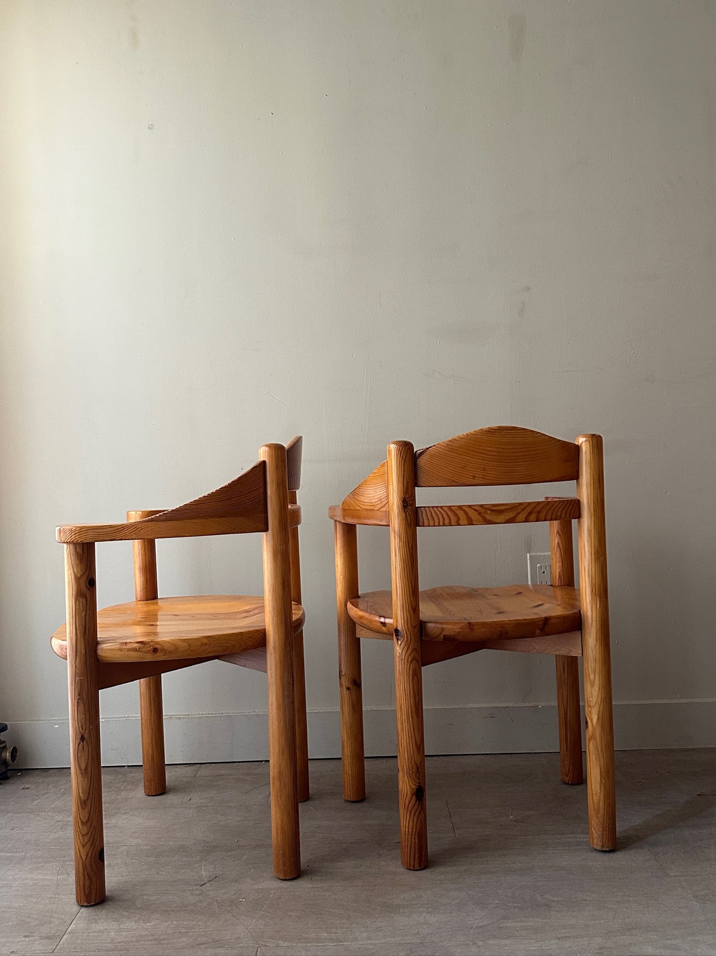 Rainer Daumiller pine dining chairs with arms. Sold as set of 2.