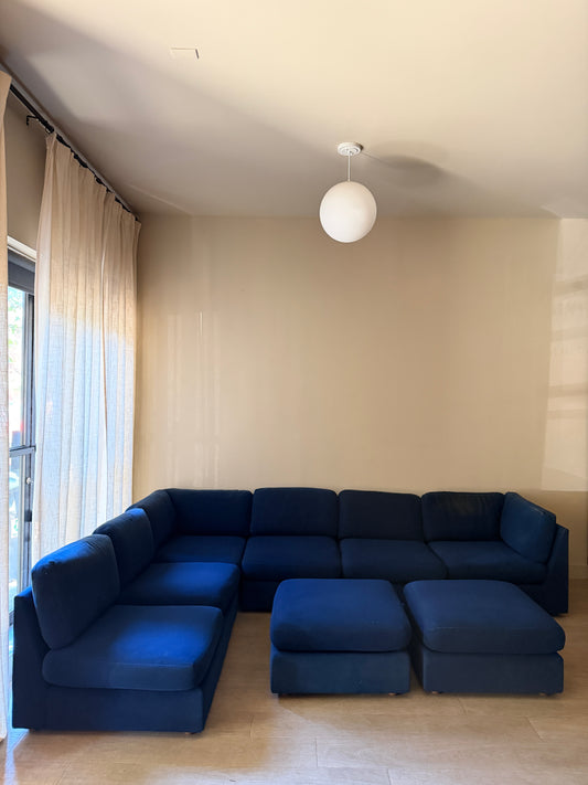 Sapphire blue modular sofa with ottomans