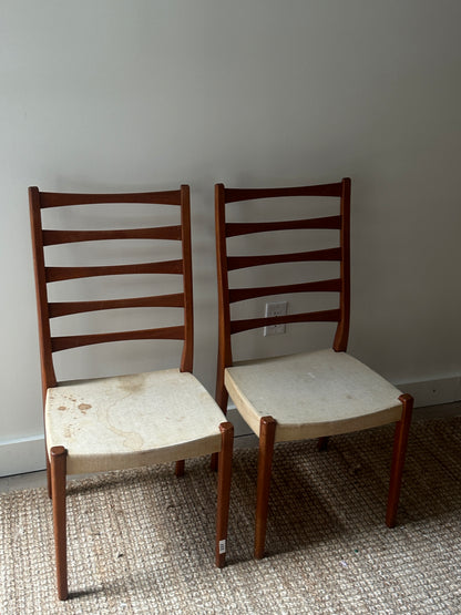 Pair of teak dining chairs