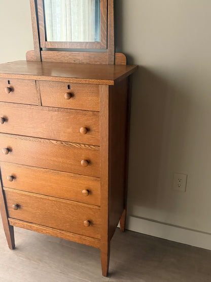 Golden oak tallboy with mirror