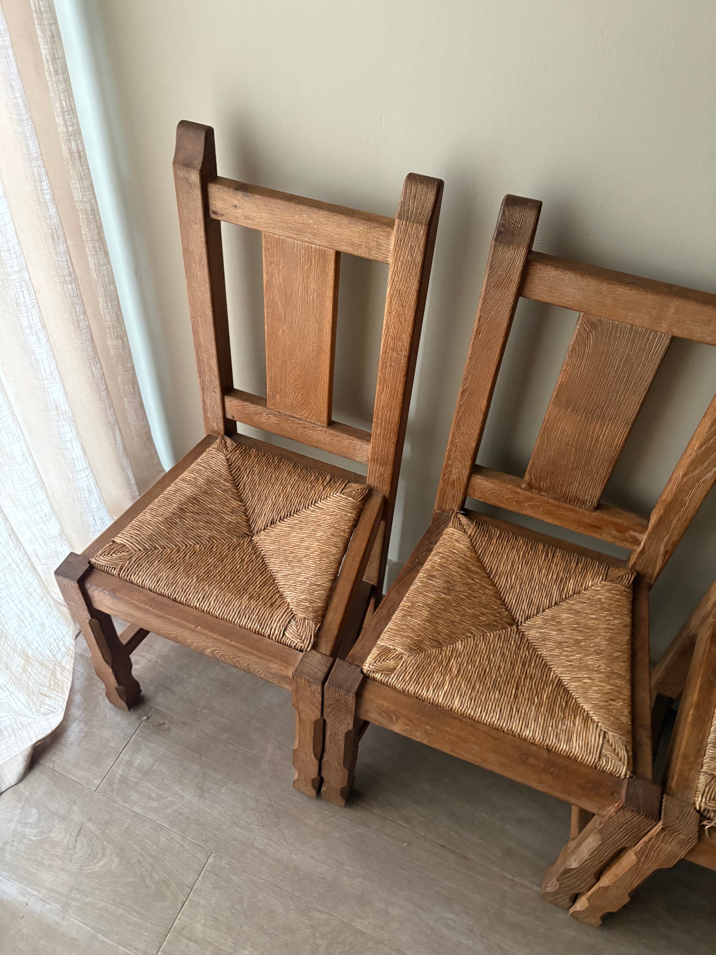 Belgian De Puydt oak & rush dining chairs. Sold in pairs.