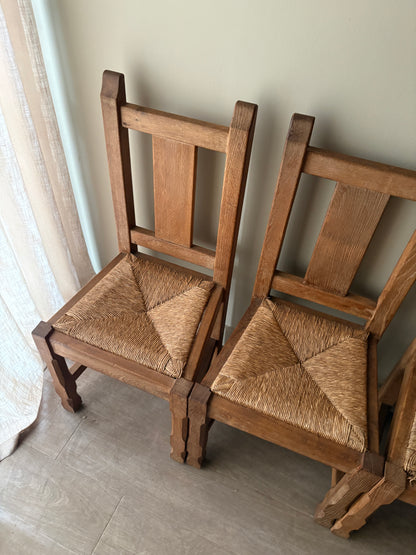 Belgian De Puydt oak & rush dining chairs. Sold in pairs.