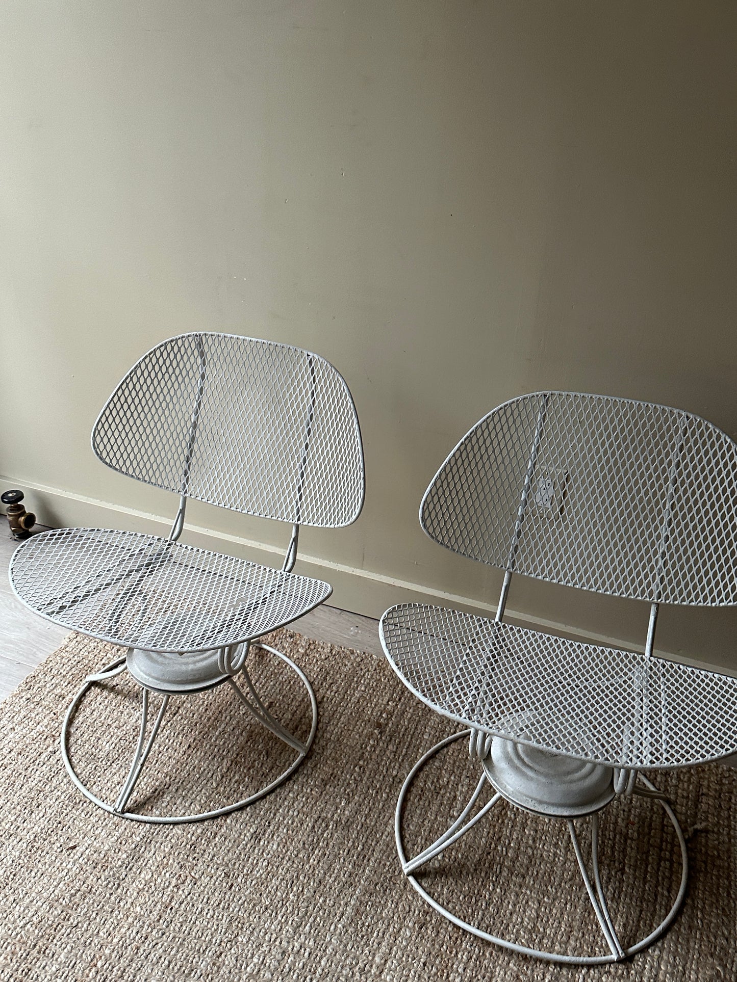 Homecrest metal clam shell swivel chairs. Sold as a set.