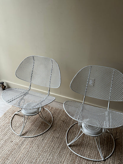 Homecrest metal clam shell swivel chairs. Sold as a set.