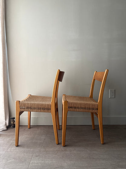 Swedish teak twisted rope seat dining chairs. Sold as a pair.