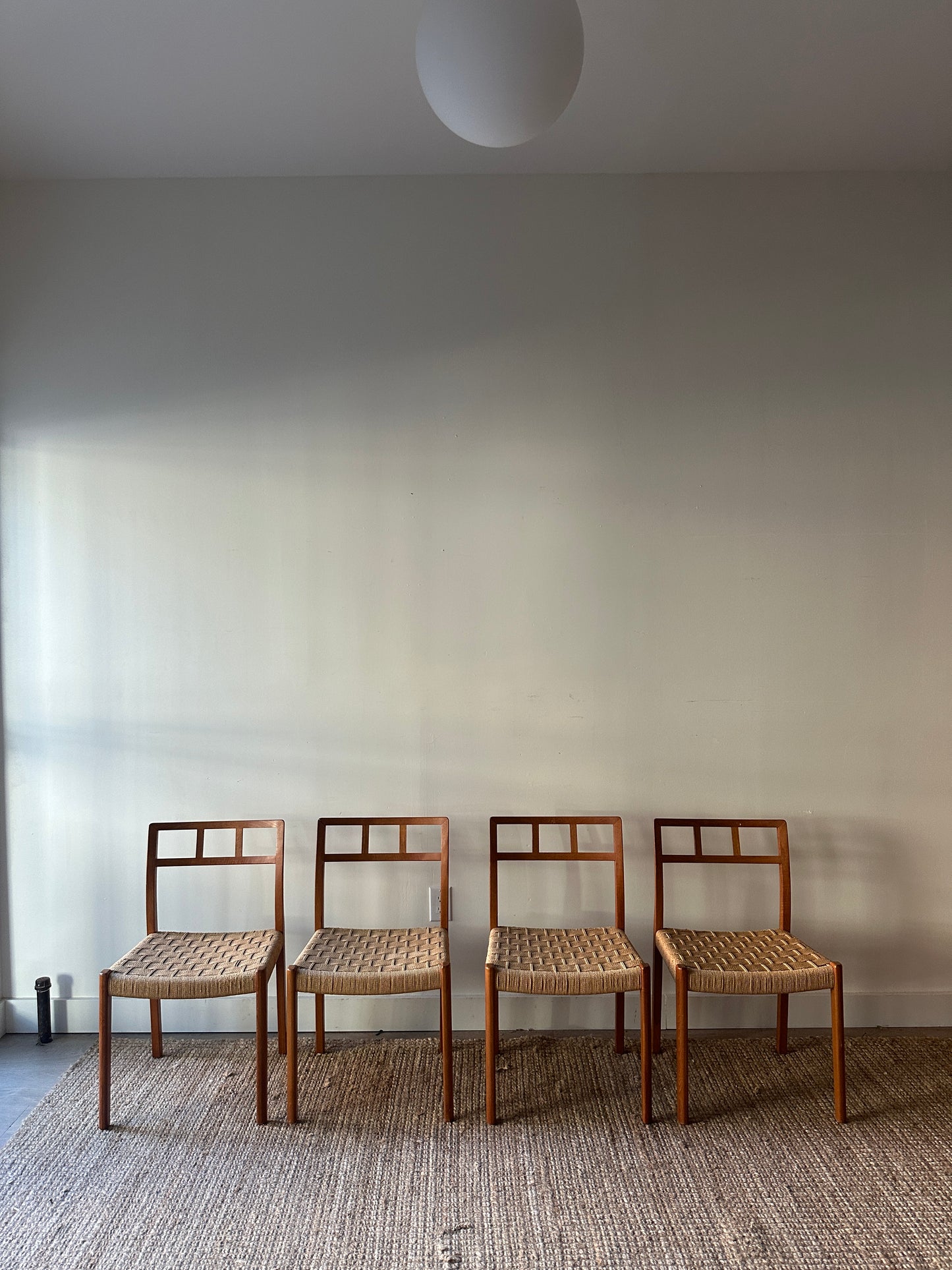 Danish teak dining chairs. Sold individually.