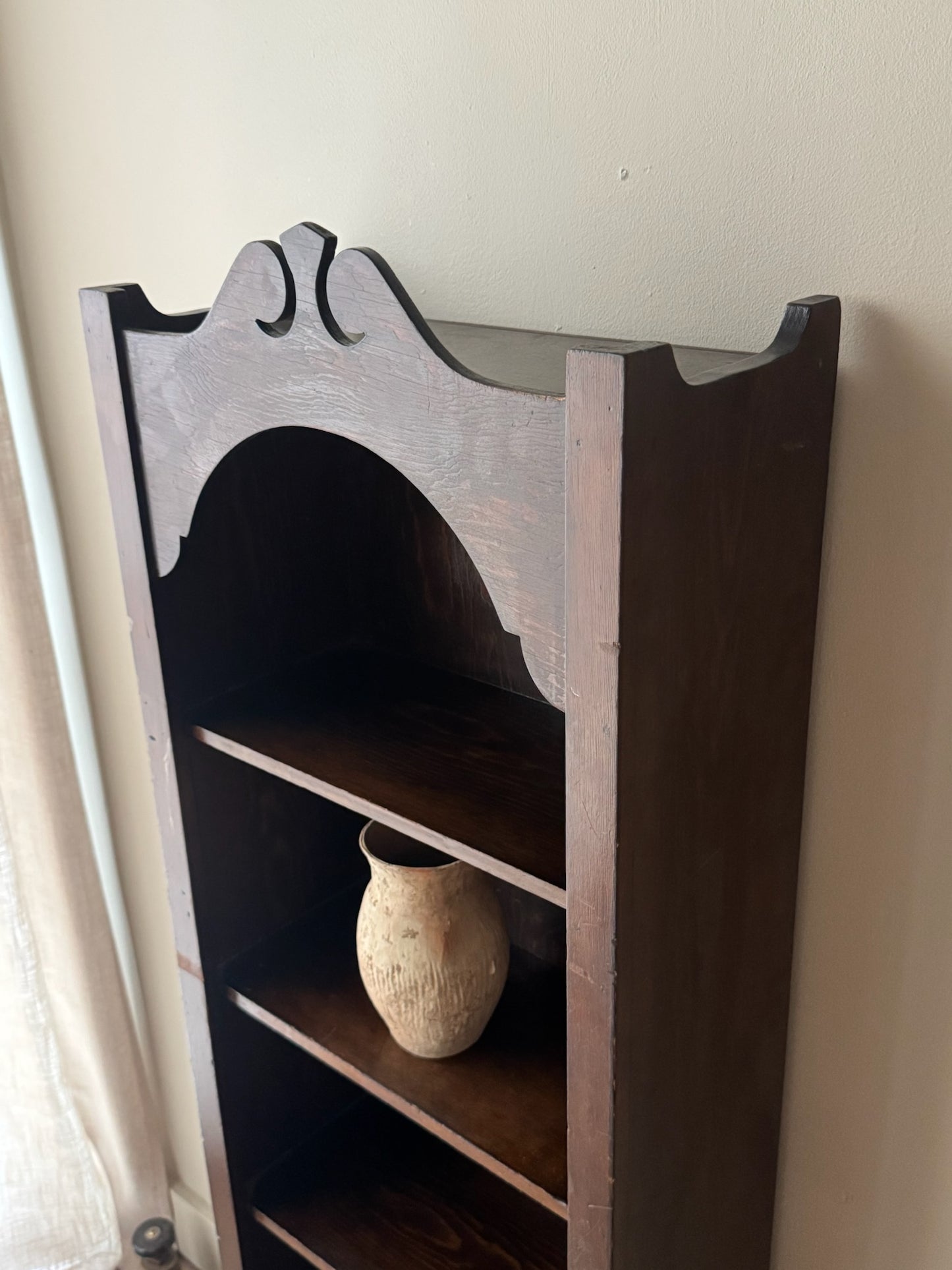 Narrow stained pine shelf