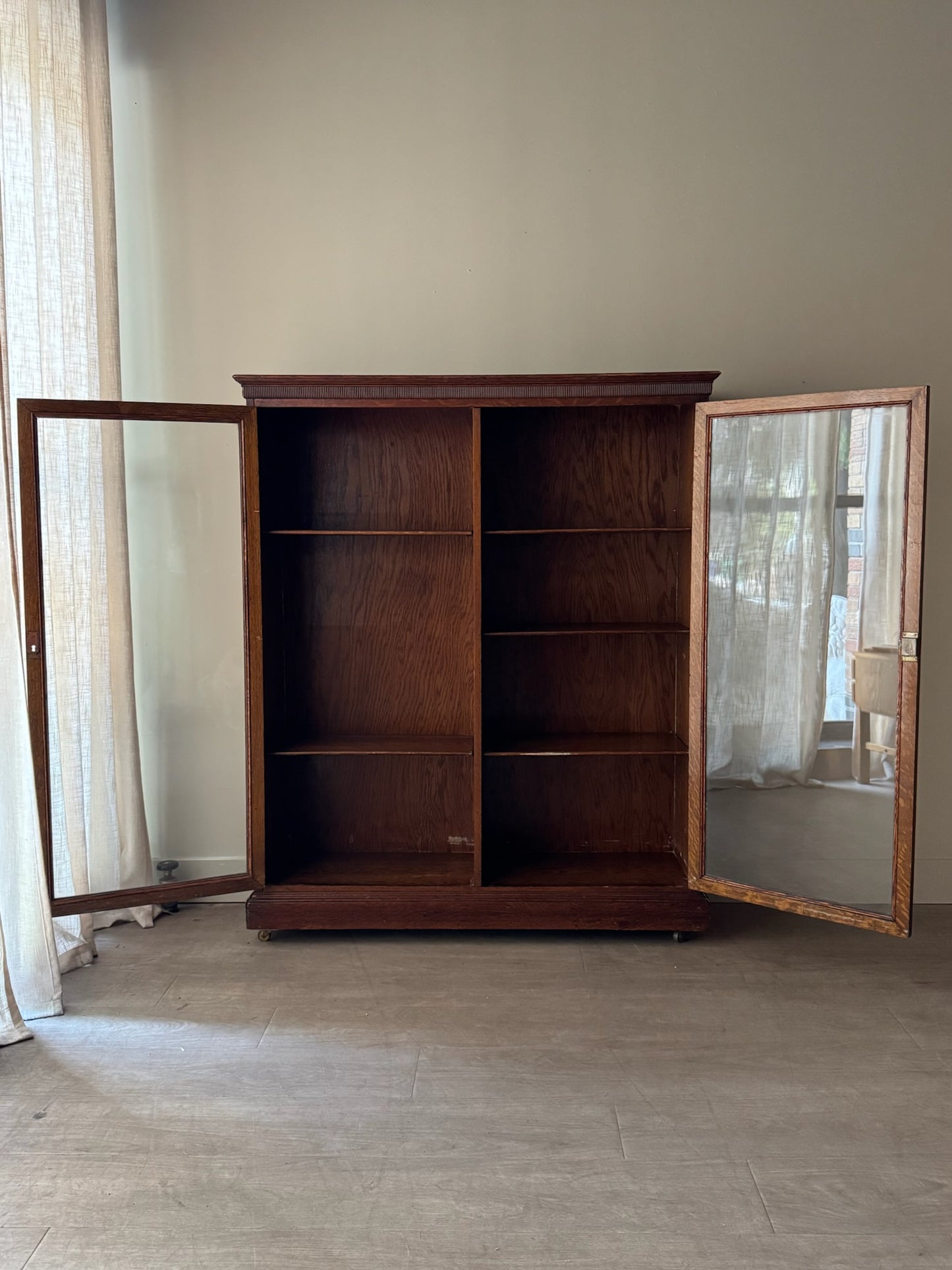 Golden oak display cabinet