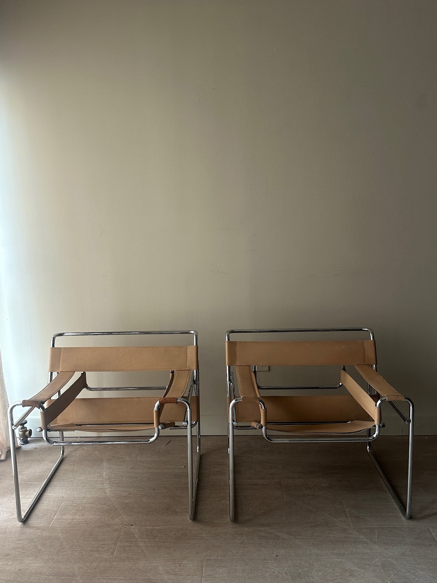 Tan Wassily chairs. Sold individually.