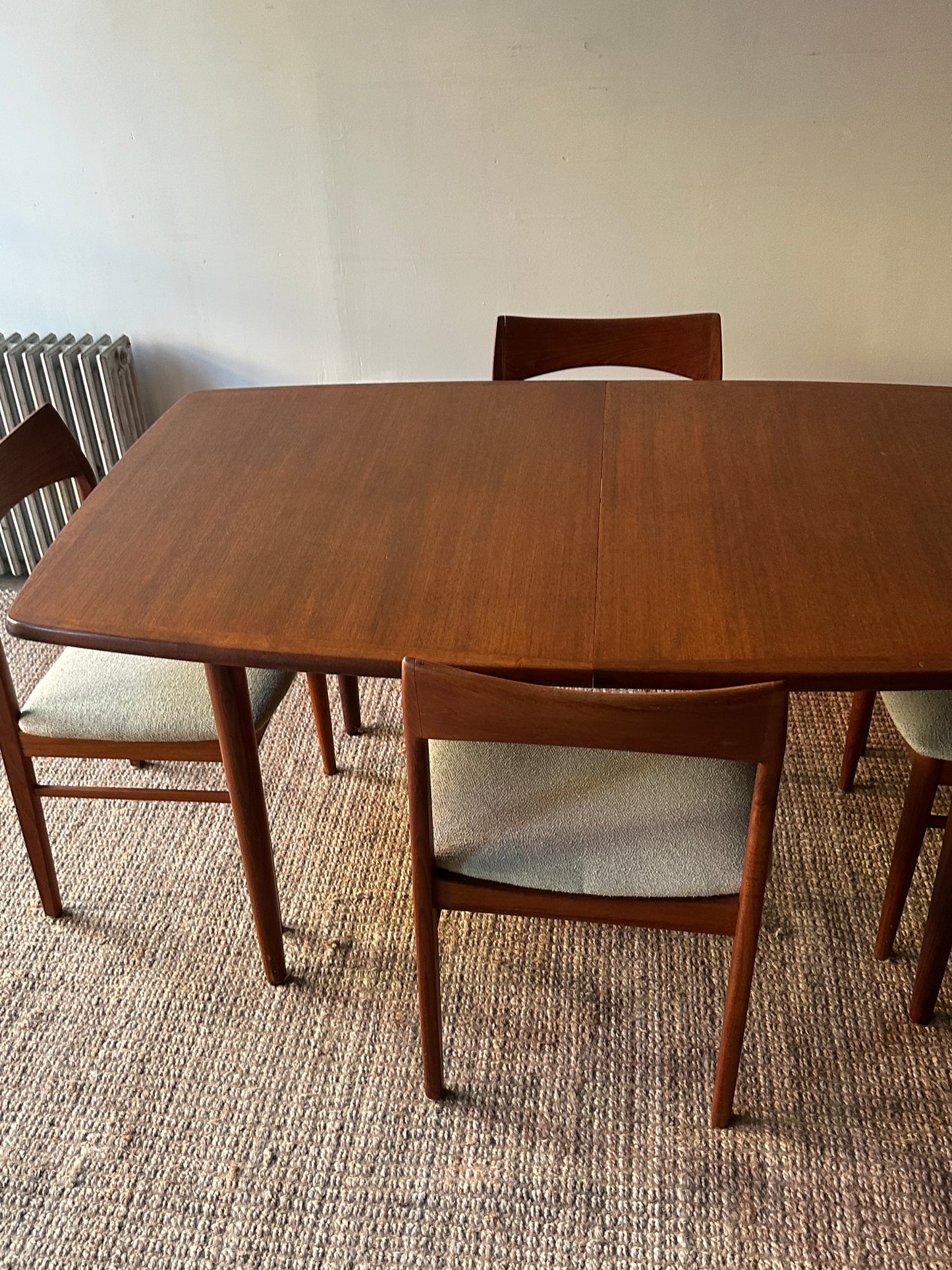 Danish teak dining table with two leaves