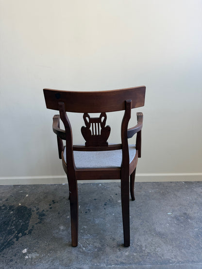 Carved mixed wood armchair