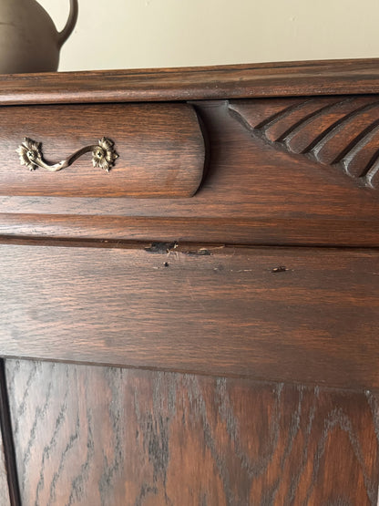 Golden oak cupboard with mirror
