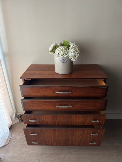Walnut tallboy with chrome handles