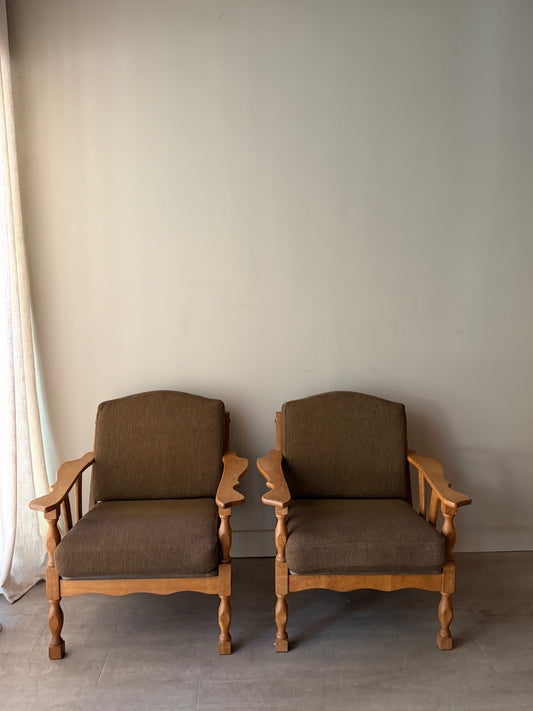 Danish oak lounge chairs. Sold individually.