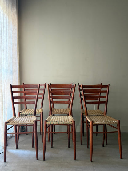 Chiavari Spinetto ladder back dining chairs with wicker cord seats. Sold as a set of 6.