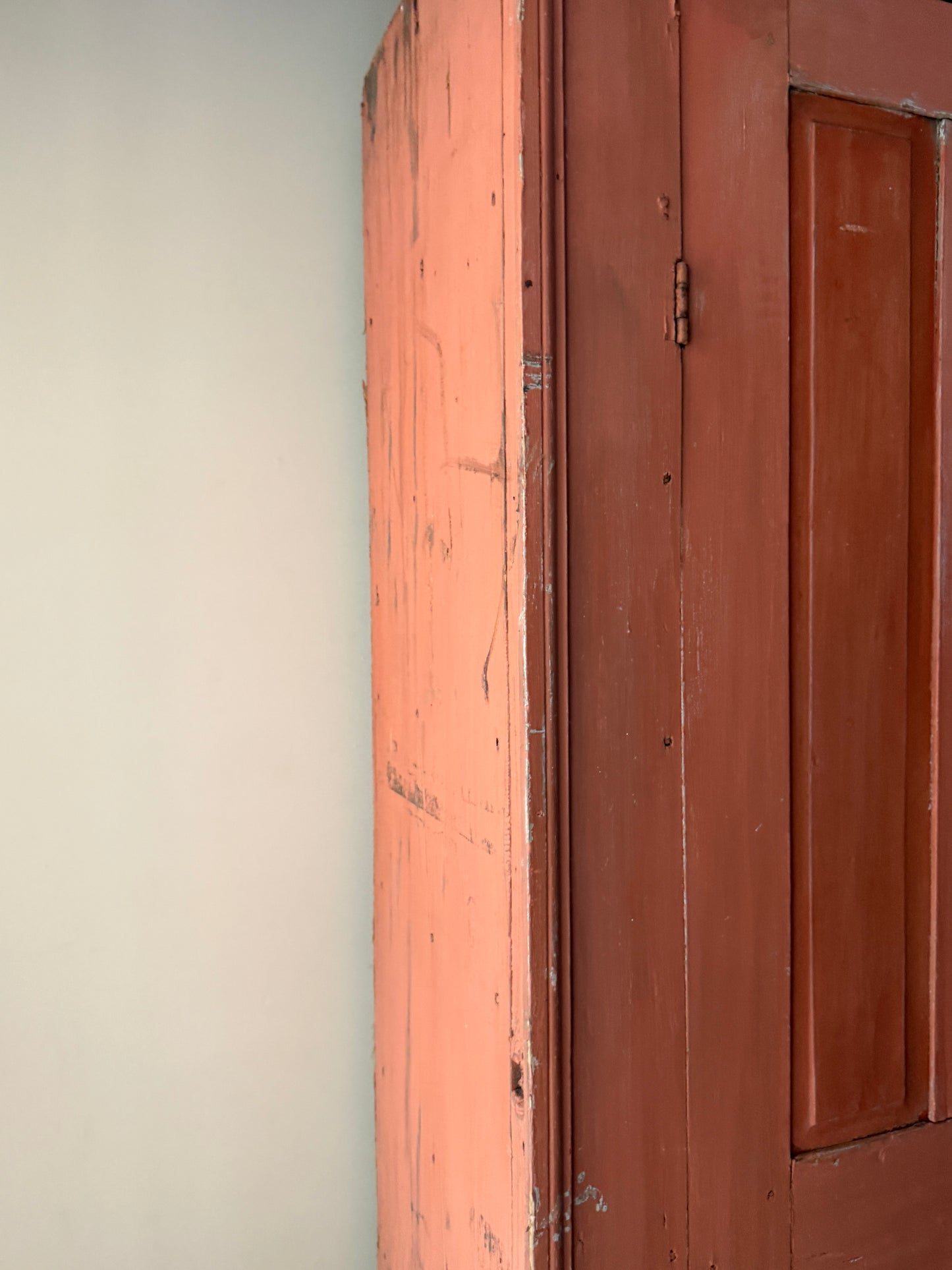 Salmon painted pine cupboard