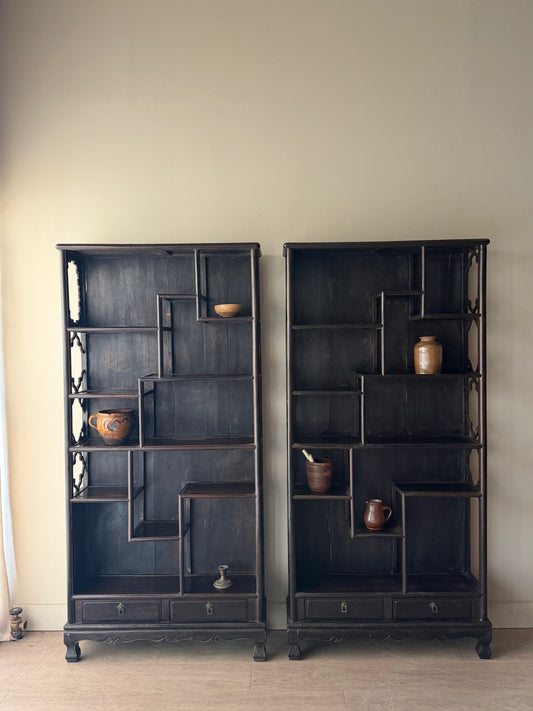 2 carved rosewood etageres. Sold individually.