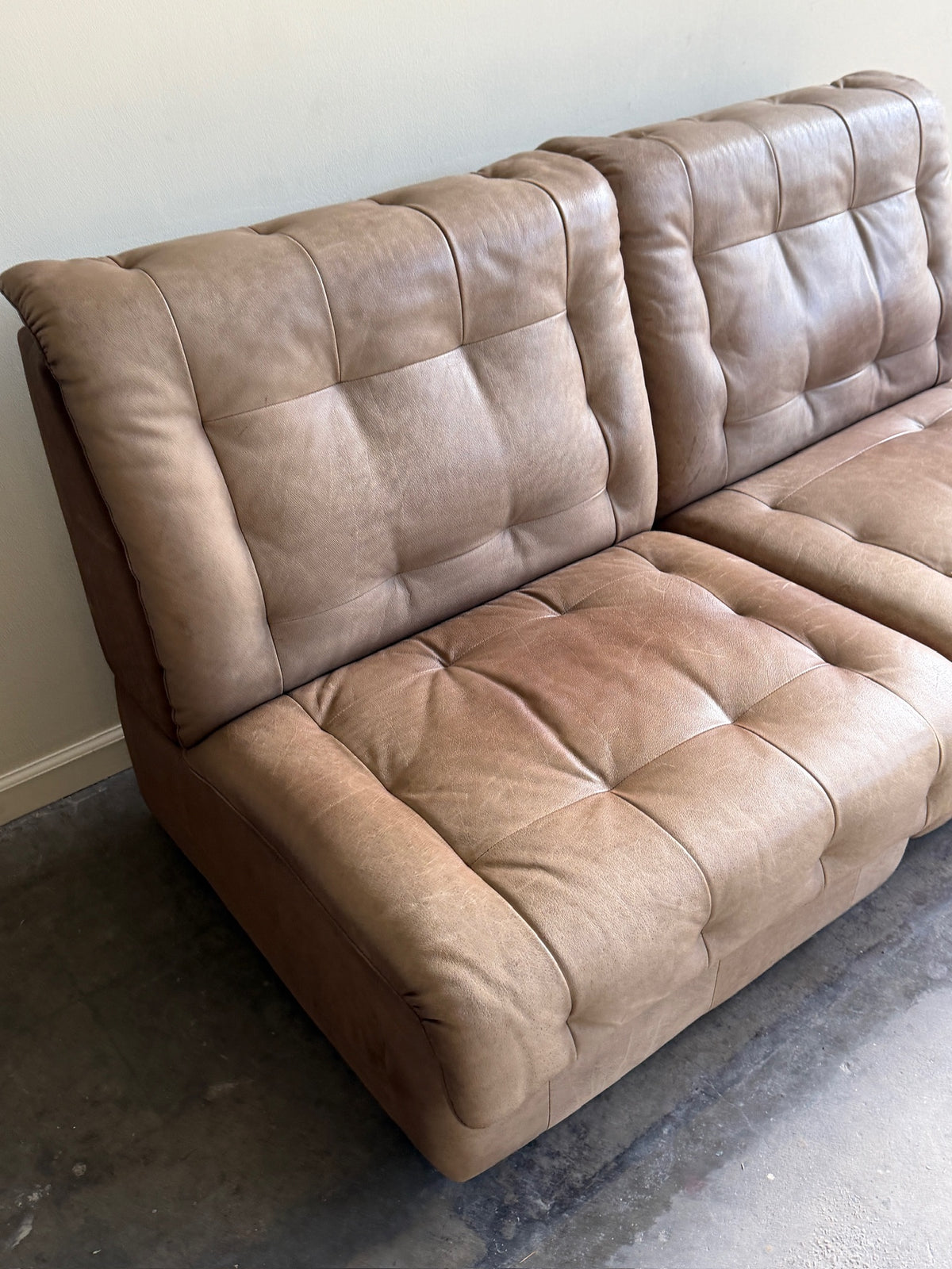 Swiss modular two-seat brown leather sofa