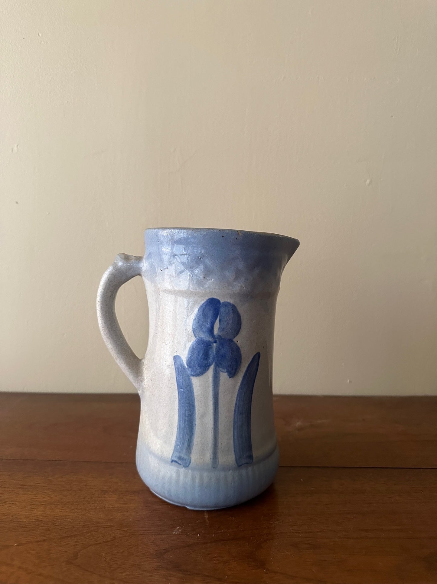 Salt glazed stoneware pitcher with flower