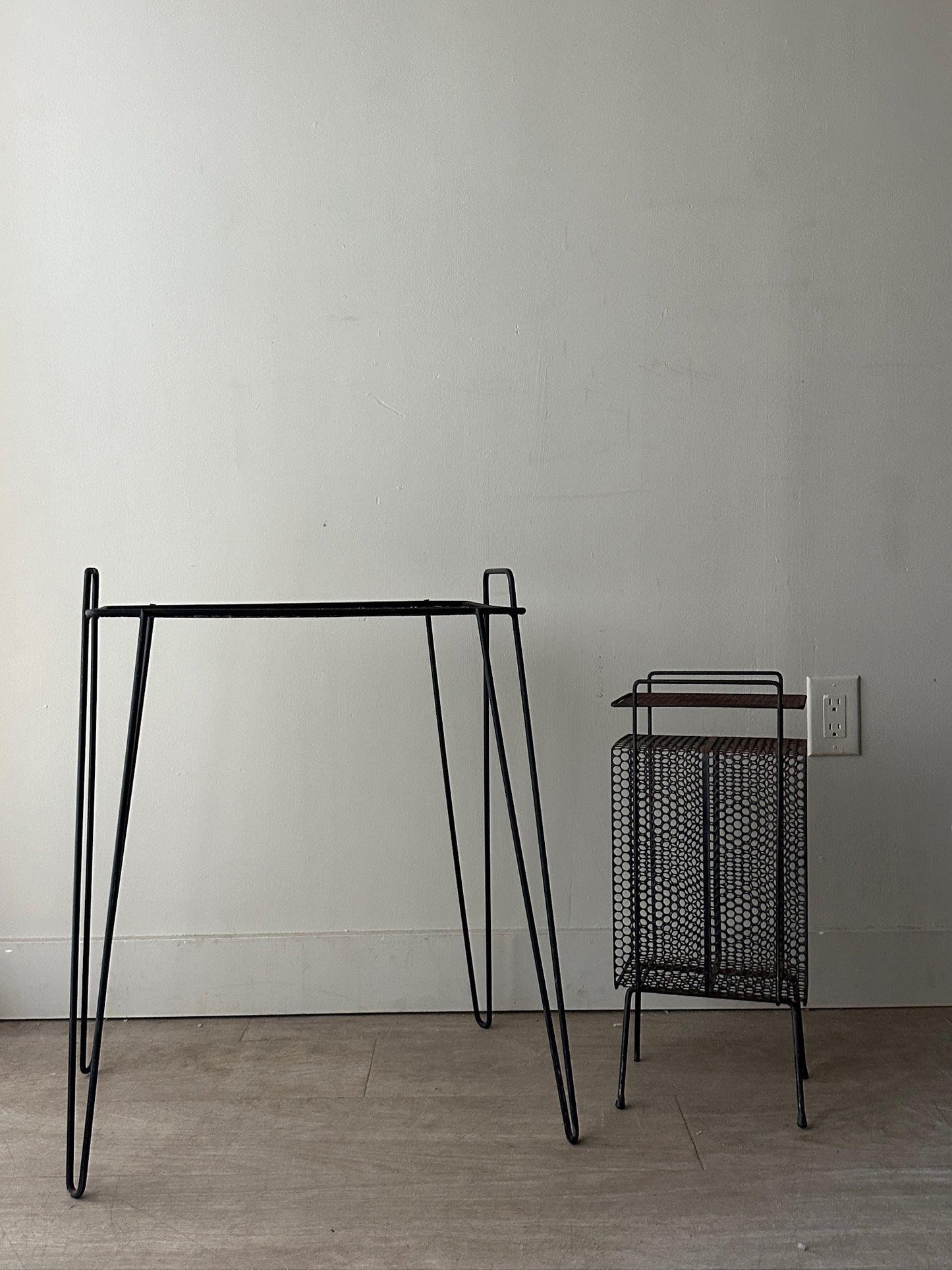 Black metal mesh side table (left)