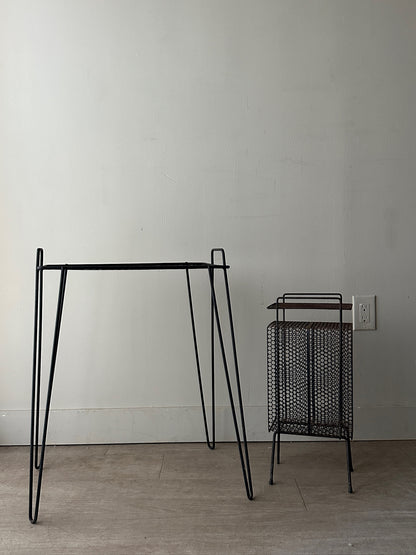 Black metal mesh side table (left)