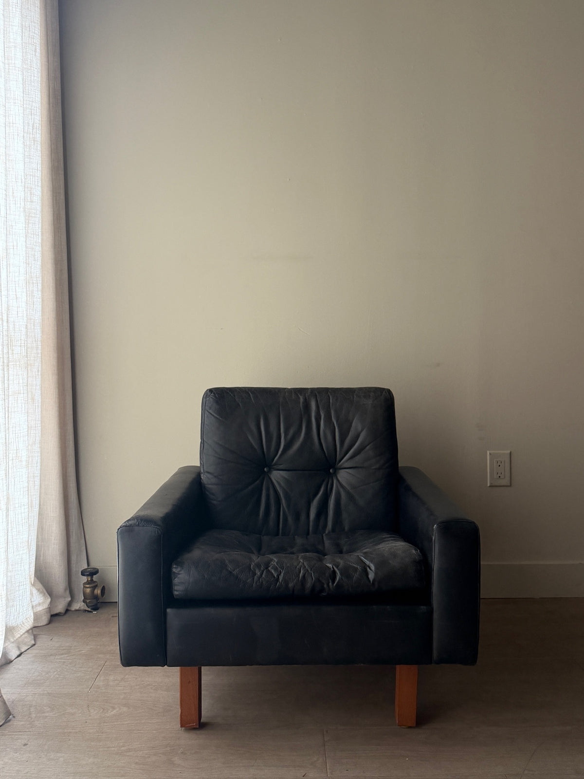 Danish black leather lounge chair