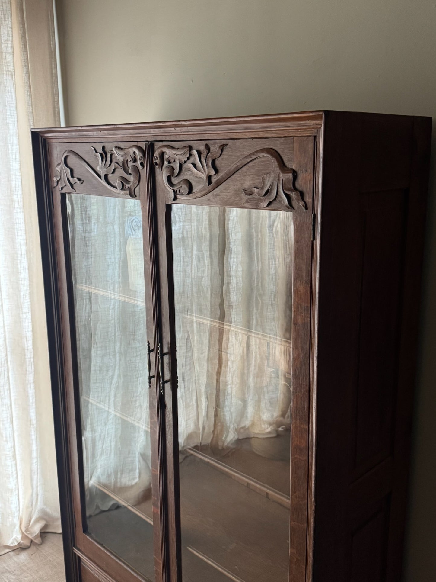 Golden oak display cabinet