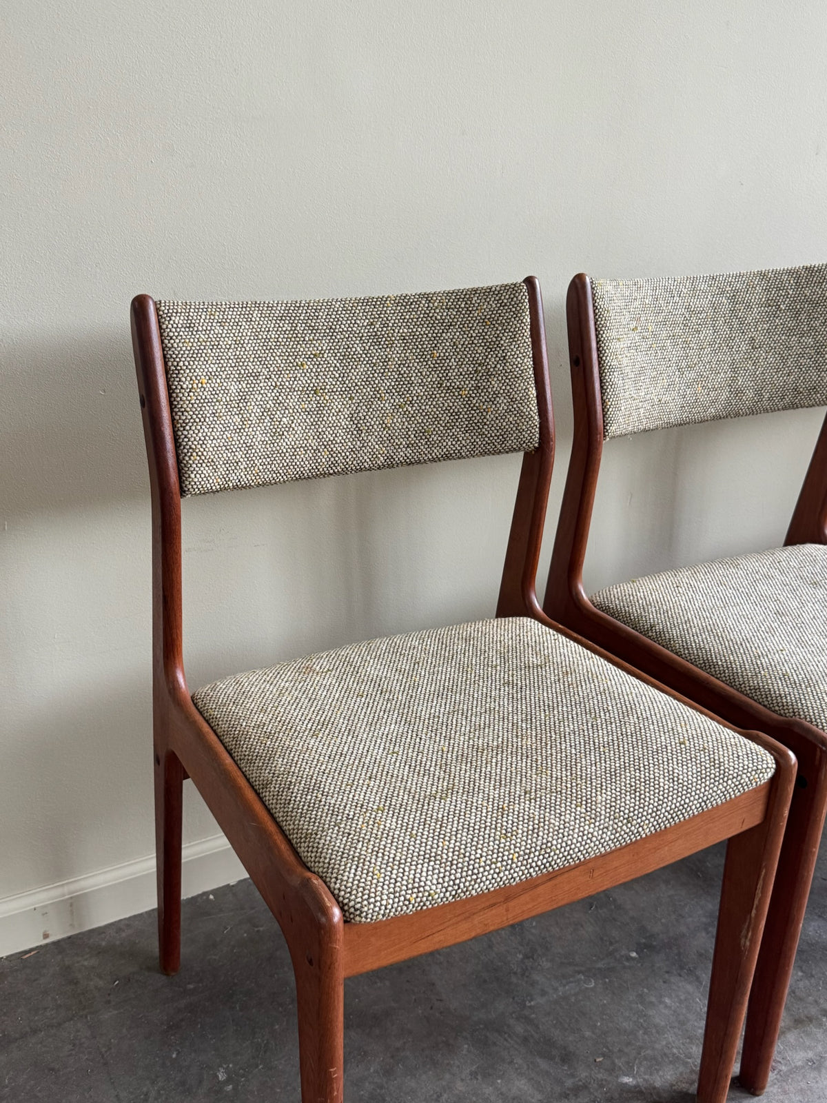 Scandinavian teak upholstered chairs. Sold in pairs.