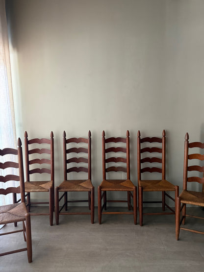 Cherry ladder back rush seat dining chairs. Sold in pairs.