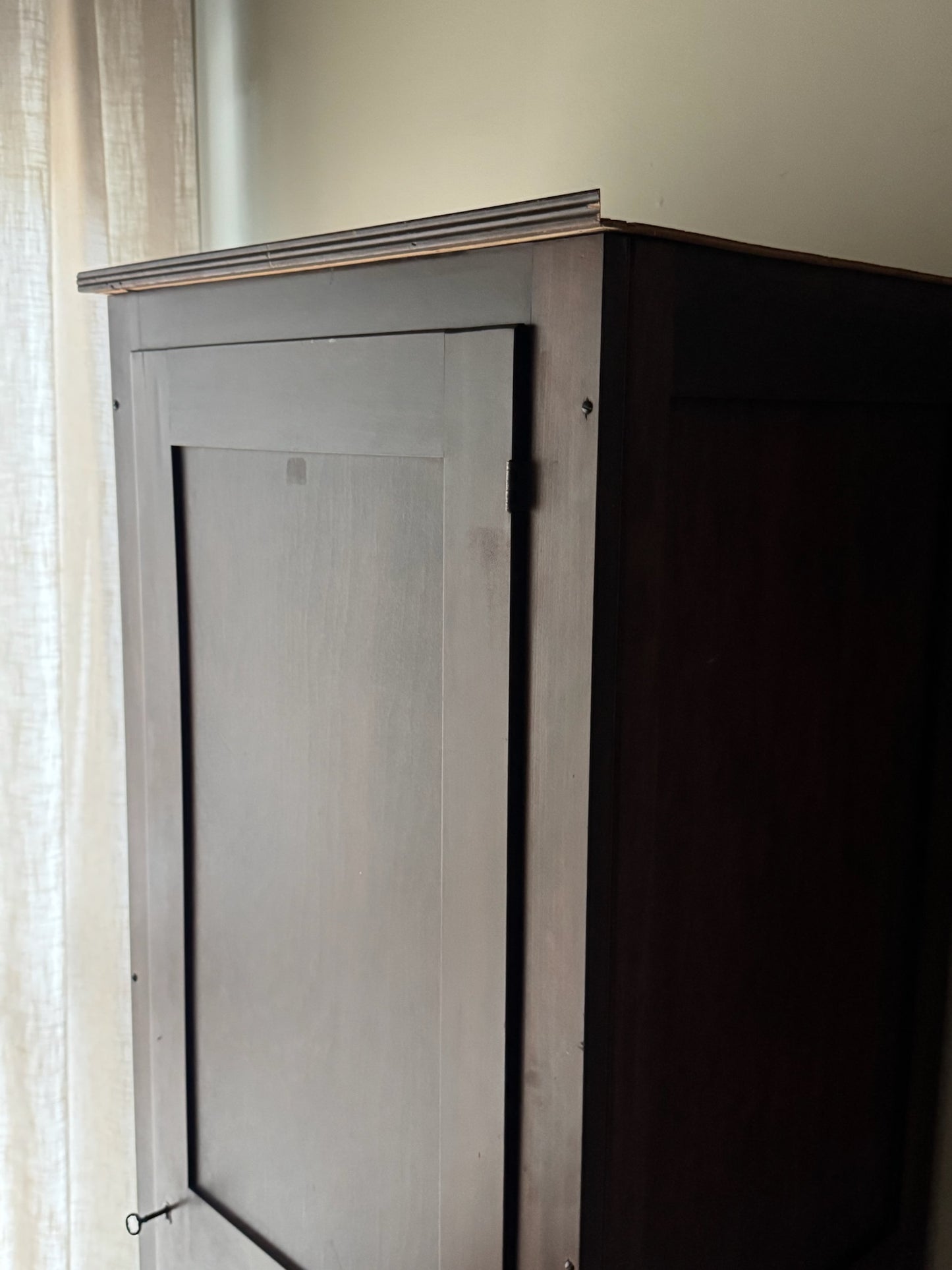 Narrow walnut armoire