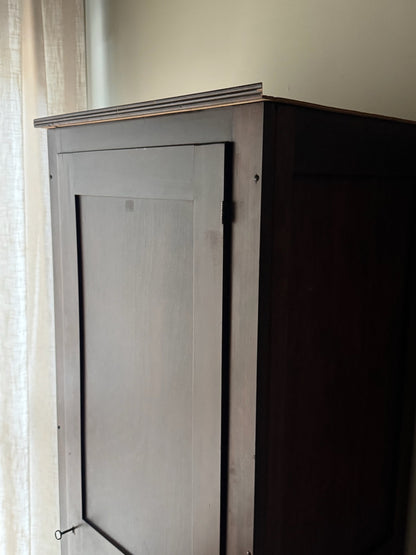 Narrow walnut armoire