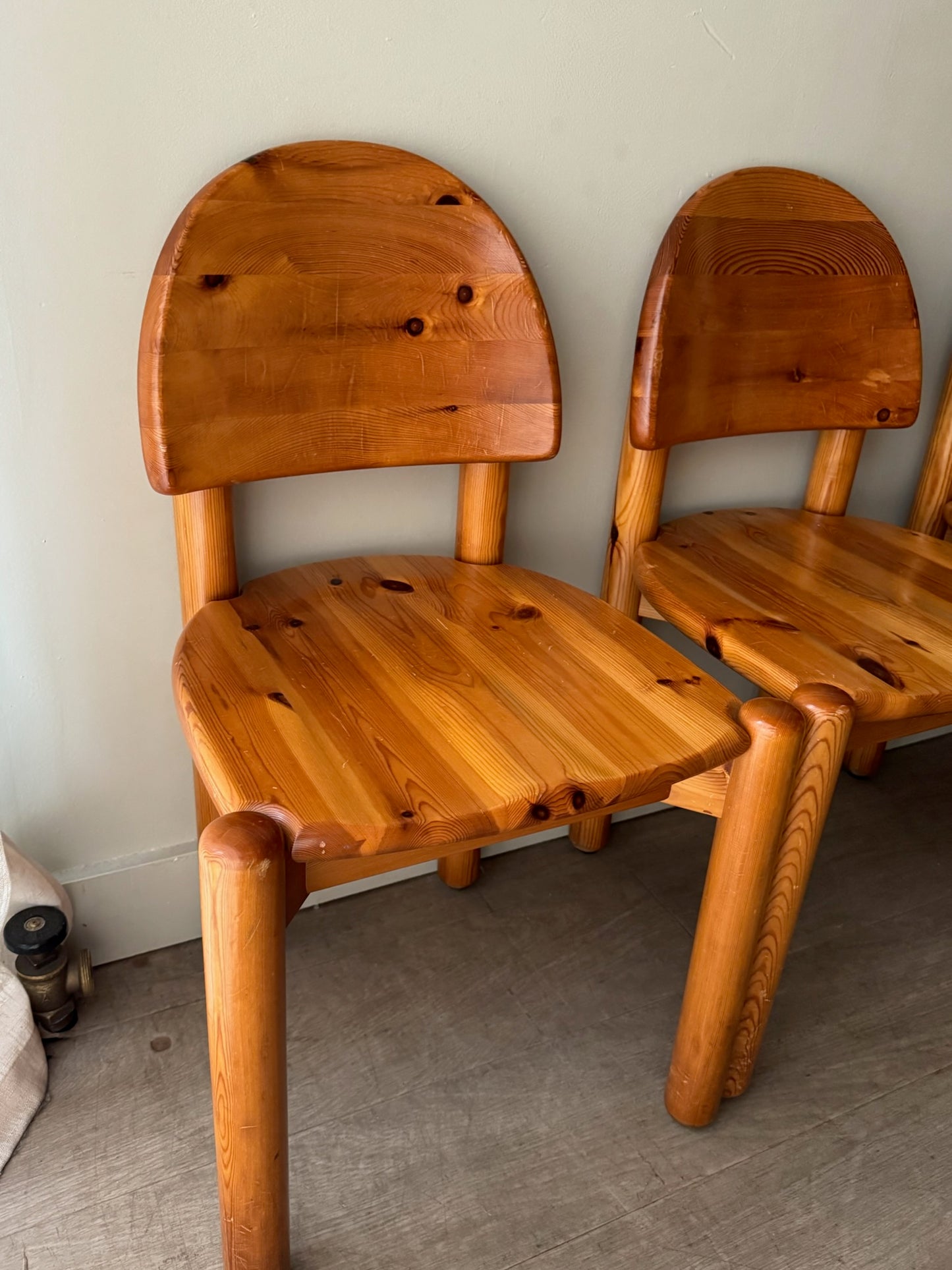 Rainer Daumiller pine dining chairs with satin finish. Sold as a set of 4.
